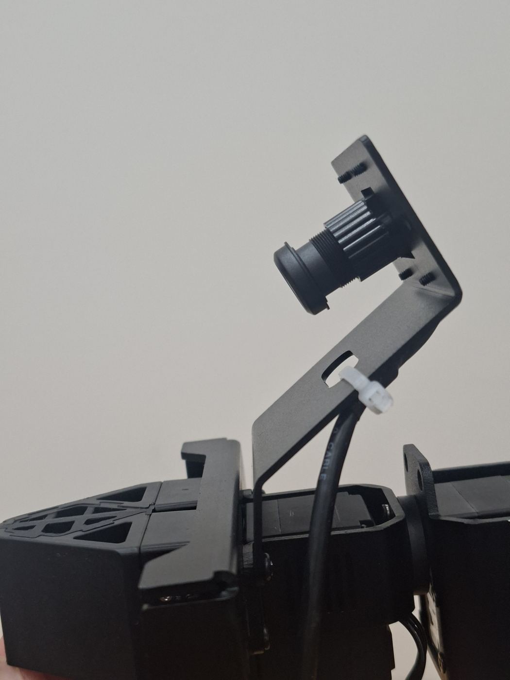 Wrist camera mount above the gripper